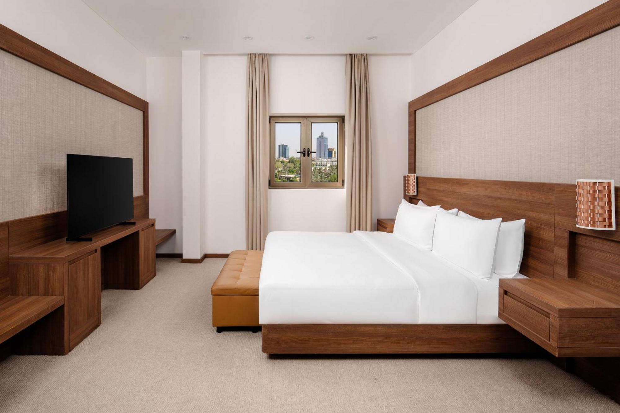 Carlton Al Moaibed Hotel Dammam Luaran gambar A bedroom at the hotel